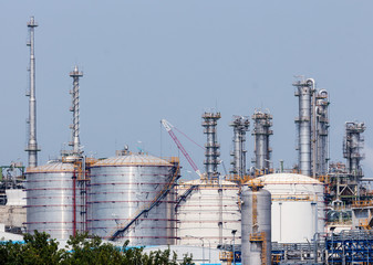 Refinery tower in petrochemical industrial plant with blue sky