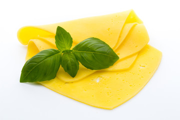 Cheese slices on the white background.