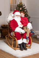 santa claus and little boy