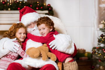 santa claus and little siblings