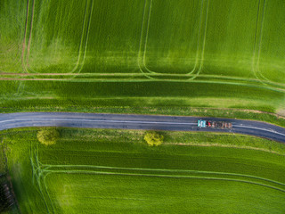 Fototapeta na wymiar Farmland from above - aerial image of a lush green filed