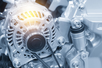 The car alternator in the light blue scene with the lighting effect.Automotive part.