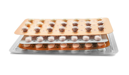 Different birth control pills on white background. Oral contraception concept