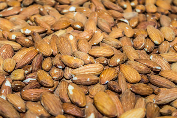 
Peeled almonds as background