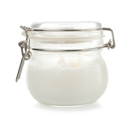 Coconut oil in mason jar on white background