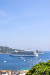 Beautiful daylight view to boats and ships on water in Villefranche-sur-Mer, France.