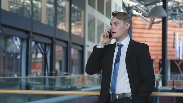 Portrait of a businessman talking on a phone
