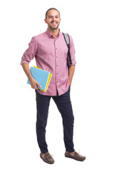 Smiling student standing with textbooks and backpack on white background