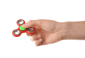 Man holding modern spinner, isolated on white