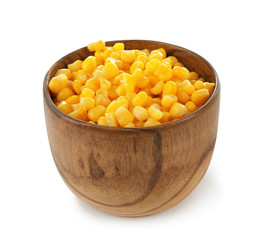 Bowl with canned corn kernels on white background
