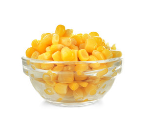 Bowl with canned corn kernels on white background