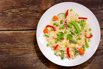 plate of noodles with vegetables