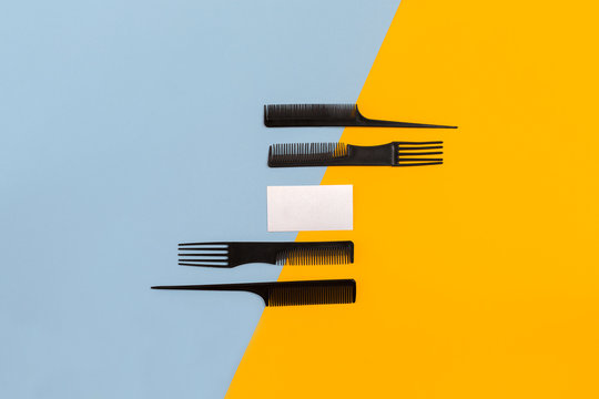 Set of combs on blue and yellow background. Top view