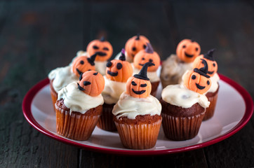 Cupcakes with orange pumpkins
