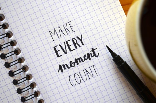 MAKE EVERY MOMENT COUNT hand-lettered in notebook