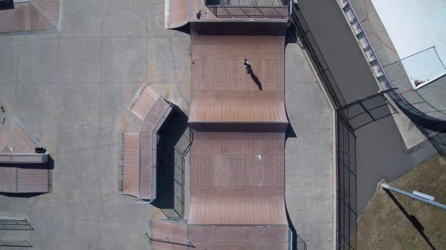 Aerial Skateboarder on a Half Pipe