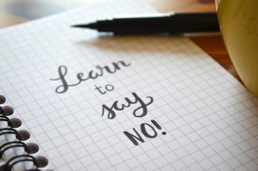 LEARN TO SAY NO hand-lettered in notebook