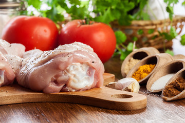 Raw chicken legs with spices