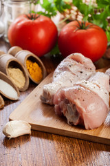Raw chicken legs with spices