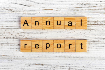 Annual report word made with wooden blocks concept