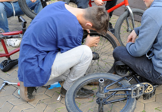 Fototapeta repair the wheel of a bicycle