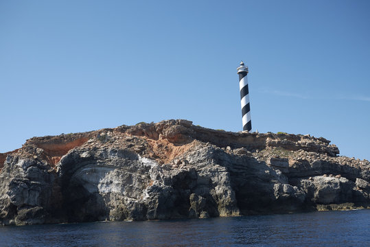 Ibiza, Balearic Islands, Spain - August 31, 2015: Lighthouse near Tago Mago