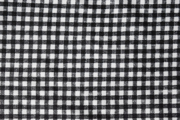 Cotton fabric natural ,Grid pattern black and white and Rough surface background.