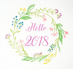 Hello 2018 on hand painting flowers wreath in watercolor style over white paper background, flowers wreath new year greeting card
