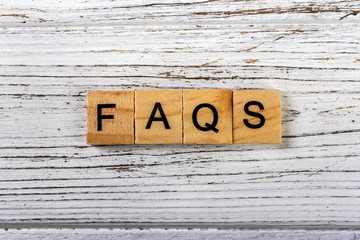 Faqs word made with wooden blocks concept