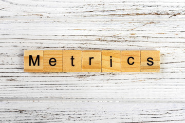 METRICS word made with wooden blocks concept