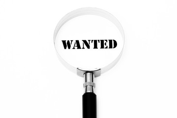 Wanted symbol with magnifier