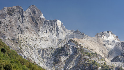 Magnificent panoramic view of the famous marble quarries of Colonnata, Carrara, Italy, on a sunny day