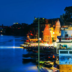 Fototapeta premium Ganges river aerial view in Varanasi, India at night