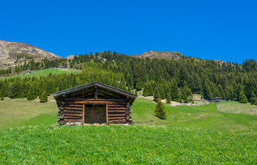 Fototapeta premium barn in the mountains with panoramic view