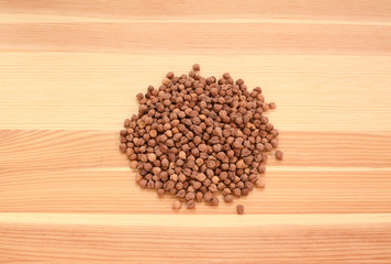 Black chickpeas on wood