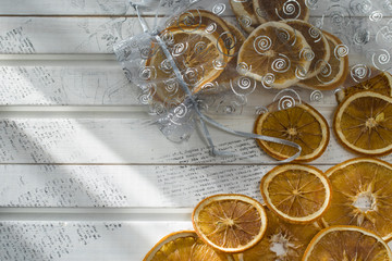 dried slice of orange over white background