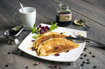 Breakfast: pancakes with honey and berry