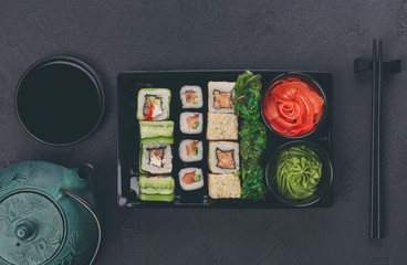 Set of sushi maki and rolls closeup in delivery box © Prostock-studio