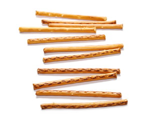 Salty cracker pretzel sticks isolated on white background