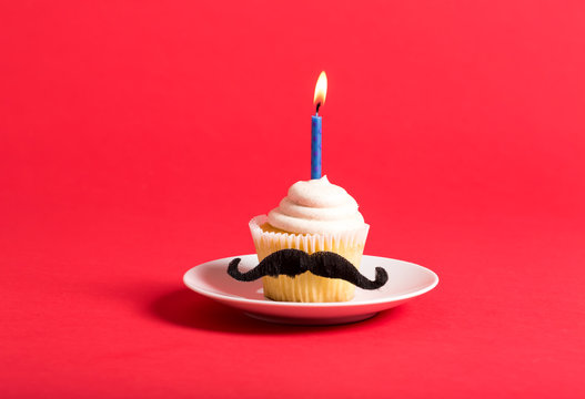 Cupcake with a moustache in Father's Day theme
