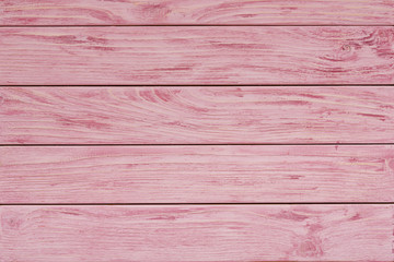 Pink wood plank texture and background.