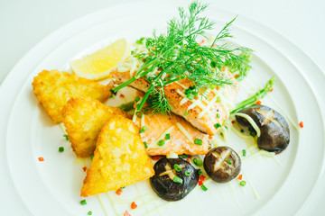 Grilled salmon meat fillet steak with vegetable