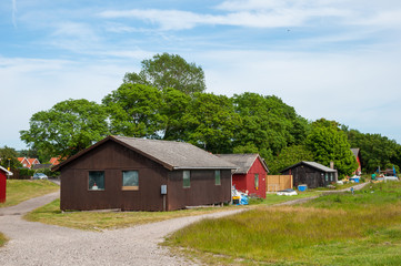 Fisherman’s sheds in Klintholm harbor in Denmark