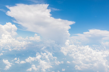 Naklejka na ściany i meble Blue sky and beautiful clouds.View from window of an airplane
