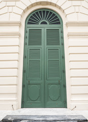 Large green wooden door.