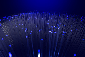 Obraz na płótnie Canvas blue fiber optic networking internet business