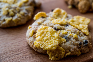 Cornflake Cookies on wooden surface.