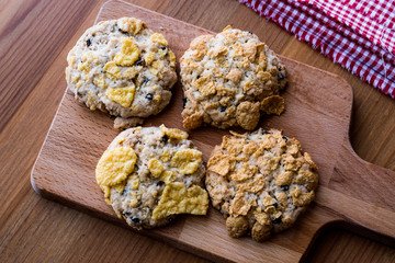 Cornflake Cookies on wooden surface.