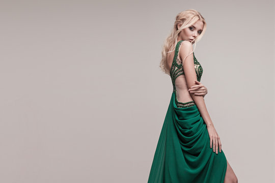 Young, gorgeous model dressed in a wedding or evening style.
