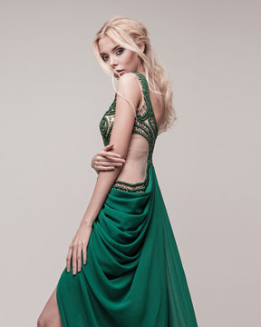 Young, gorgeous model dressed in a wedding or evening style.